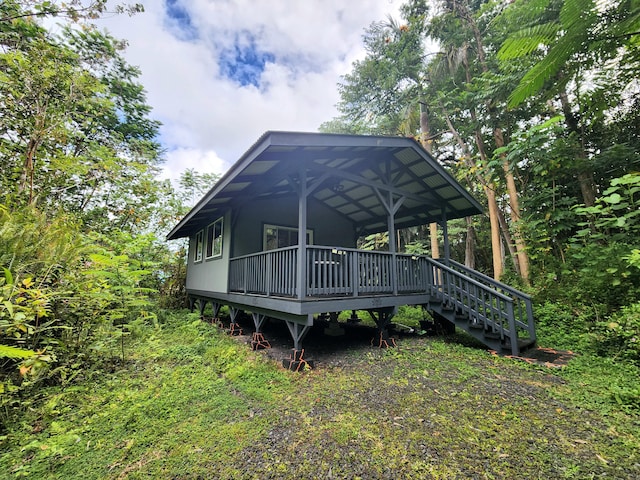 13-831 Malama St, Pahoa, HI 96778 - back of house with a wooden deck
