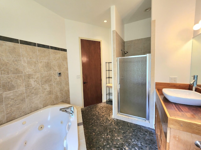 13-831 Malama St, Pahoa, HI 96778 - bathroom featuring a stall shower, a whirlpool tub, and vanity
