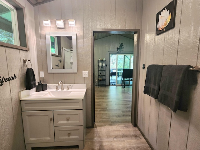 13-831 Malama St, Pahoa, HI 96778 - bathroom with wood finished floors, vanity, and wooden walls