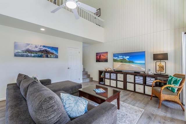 5300 Ka Haku Rd Unit 1, Princeville, HI 96722 - living area featuring a towering ceiling, wood finished floors, stairway, a ceiling fan, and recessed lighting