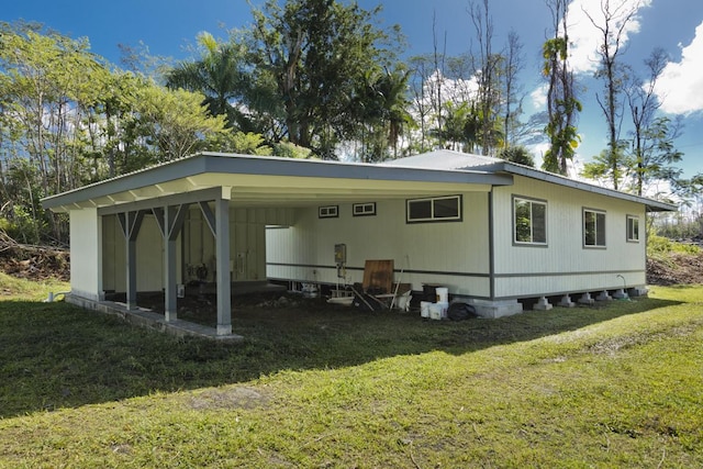 15-1983 27th Ave, Keaau, HI 96749 - rear view of house with a yard and a carport