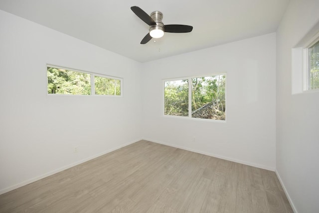 15-1983 27th Ave, Keaau, HI 96749 - unfurnished room with light wood-style floors, baseboards, and a ceiling fan