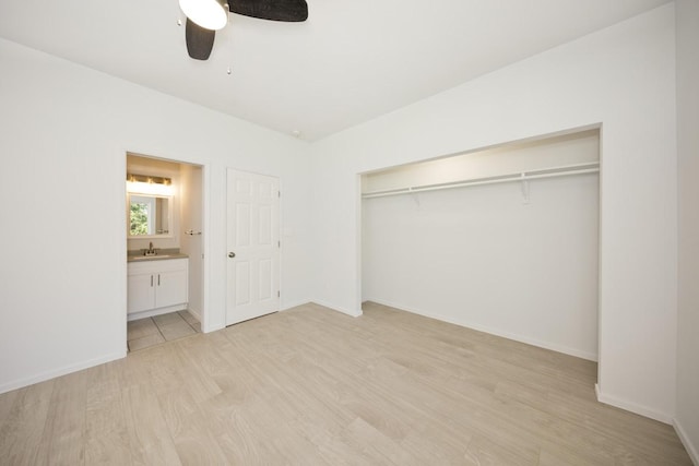 15-1983 27th Ave, Keaau, HI 96749 - unfurnished bedroom with a sink, light wood-style flooring, a closet, ensuite bath, and ceiling fan