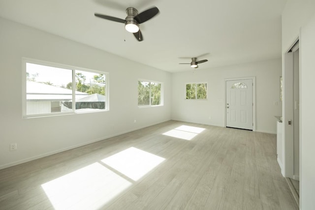 15-1983 27th Ave, Keaau, HI 96749 - unfurnished room with a ceiling fan, light wood-type flooring, and baseboards