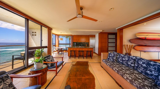 5050 Lawai Rd Unit 413, Koloa, HI 96756 - living area featuring ceiling fan, a water view, and recessed lighting