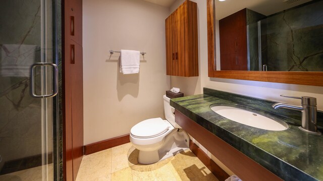 5050 Lawai Rd Unit 413, Koloa, HI 96756 - full bath featuring vanity, toilet, a shower stall, and baseboards