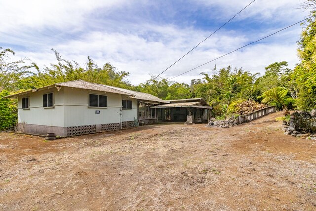44-3275 Hoo Kahua Rd, Honokaa, HI 96727 - view of front of home featuring a sunroom and crawl space