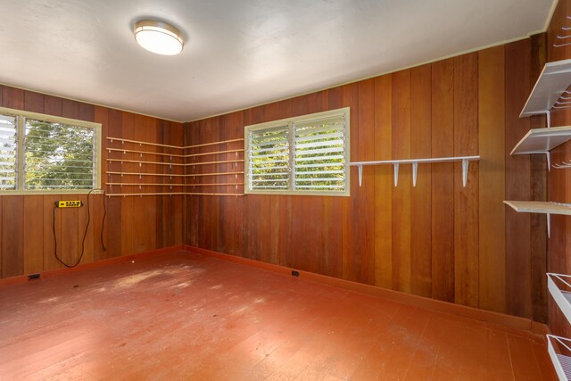 44-3275 Hoo Kahua Rd, Honokaa, HI 96727 - unfurnished room featuring plenty of natural light, hardwood / wood-style floors, and wooden walls