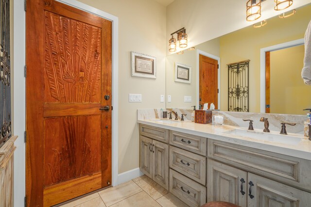 48-5319 Kukuihaele Rd, Honokaa, HI 96727 - full bath with double vanity, tile patterned floors, and baseboards
