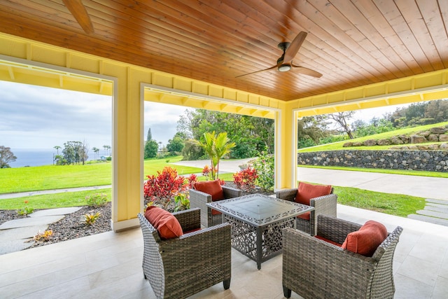 48-5319 Kukuihaele Rd, Honokaa, HI 96727 - view of patio / terrace featuring a water view and ceiling fan