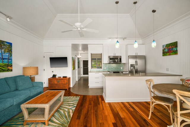 2253 Poipu Rd Unit 162, Koloa, HI 96756 - kitchen with appliances with stainless steel finishes, dark wood-style floors, open floor plan, white cabinets, and lofted ceiling