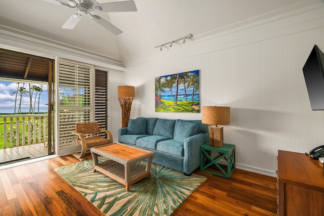 2253 Poipu Rd Unit 162, Koloa, HI 96756 - living room featuring vaulted ceiling, wood finished floors, rail lighting, ceiling fan, and baseboards
