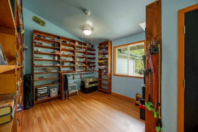 13-3477 Alapai St, Pahoa, HI 96778 - unfurnished office with light wood-style flooring, a ceiling fan, vaulted ceiling, and baseboards