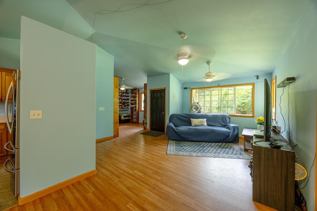 13-3477 Alapai St, Pahoa, HI 96778 - living area with light wood-type flooring, a ceiling fan, and baseboards