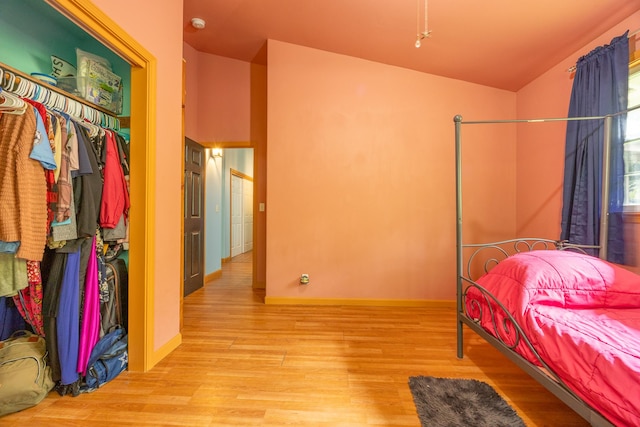 13-3477 Alapai St, Pahoa, HI 96778 - bedroom with wood finished floors, lofted ceiling, and baseboards