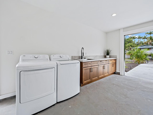 15-2792 Opae St, Pahoa, HI 96778 - laundry area featuring cabinet space, washing machine and dryer, and recessed lighting