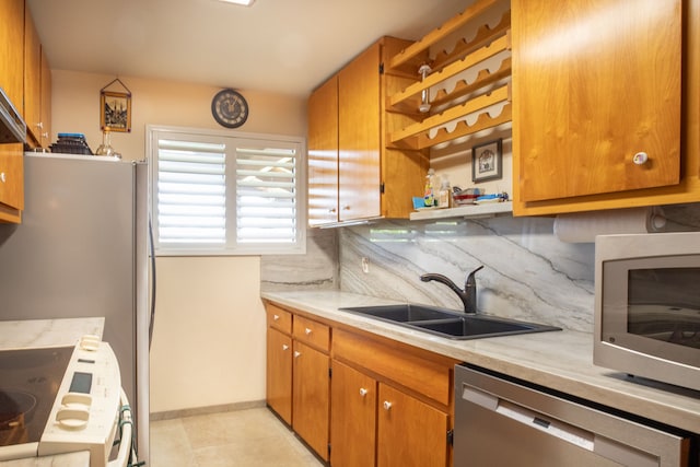 68-1853 W Kaupapa Pl, Waikoloa, HI 96738 - kitchen with stainless steel appliances, a sink, open shelves, and brown cabinets