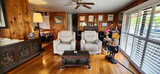 68-1853 W Kaupapa Pl, Waikoloa, HI 96738 - living area featuring ceiling fan, wood finished floors, and wood walls