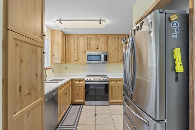 15-1948 12th Ave, Keaau, HI 96749 - kitchen with appliances with stainless steel finishes, light brown cabinetry, a sink, light tile patterned flooring, and light countertops