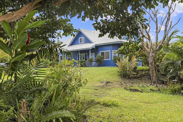 15-1948 12th Ave, Keaau, HI 96749 - view of front facade featuring a front lawn