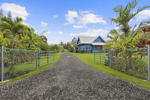 15-1948 12th Ave, Keaau, HI 96749 - view of dirt / gravel road with a gate and a gated entry