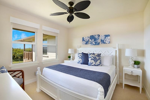 2611 Kiahuna Plantation Dr Unit 13B, Koloa, HI 96756 - bedroom with baseboards, light carpet, and ceiling fan