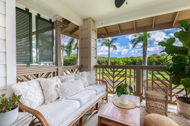 2611 Kiahuna Plantation Dr Unit 4G, Koloa, HI 96756 - sunroom with an outdoor living space and beamed ceiling