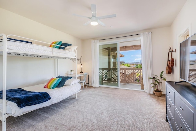 2611 Kiahuna Plantation Dr Unit 4G, Koloa, HI 96756 - carpeted bedroom featuring access to outside and ceiling fan