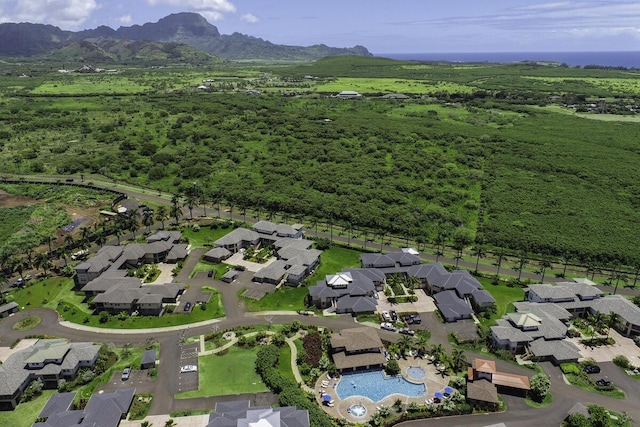 2611 Kiahuna Plantation Dr Unit 4G, Koloa, HI 96756 - aerial overview of property's location featuring mountains, a pool, and nearby suburban area