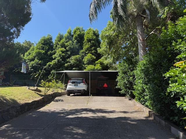 48-5441 Kukuihaele Rd, Honokaa, HI 96727 - view of front facade featuring concrete driveway