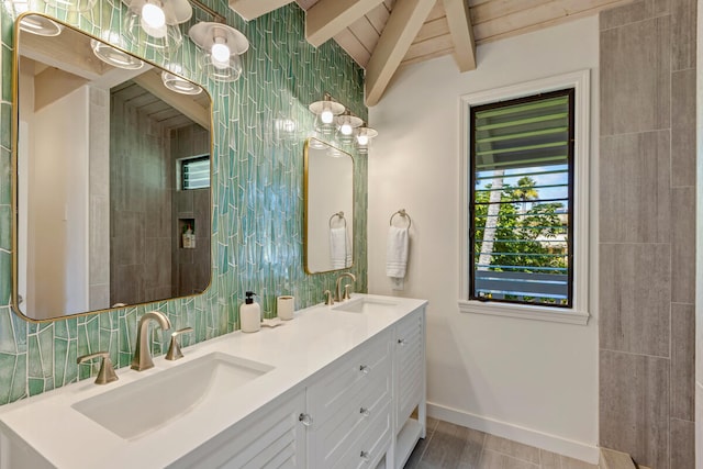 4160 Kalani Pl, Princeville, HI 96722 - bathroom featuring double vanity, decorative backsplash, and baseboards