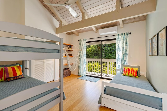 4160 Kalani Pl, Princeville, HI 96722 - bedroom with an AC wall unit, access to outside, wood finished floors, wooden ceiling, and baseboards