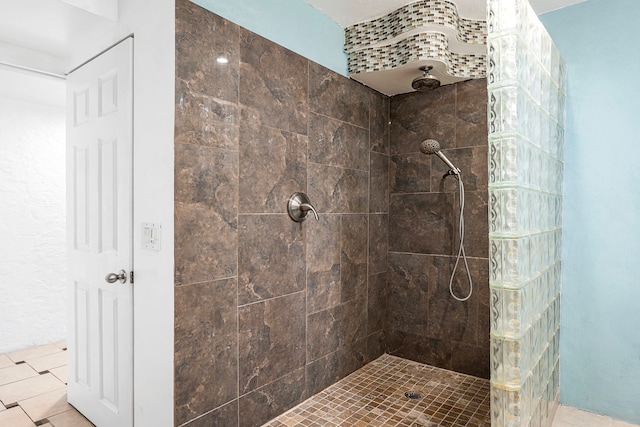 75-6082 Alii Dr Unit B229, Kailua-Kona, HI 96740 - bathroom featuring tiled shower and tile patterned flooring