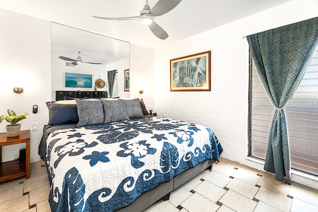75-6082 Alii Dr Unit B229, Kailua-Kona, HI 96740 - bedroom with tile patterned flooring and ceiling fan