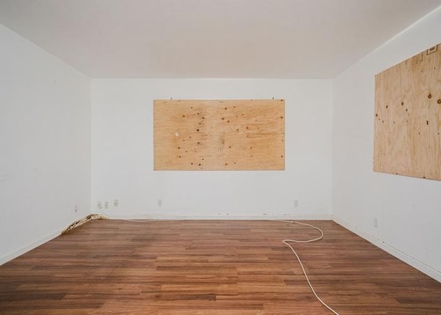 68-1736 Puwalu St, Waikoloa, HI 96738 - empty room with wood finished floors and baseboards