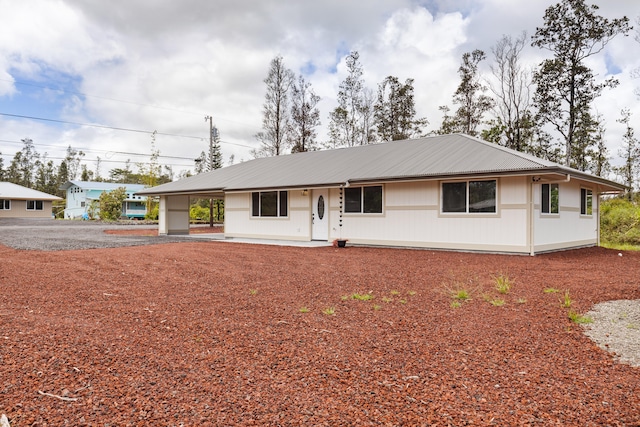 16-2071 Kuhio Dr, Pahoa, HI 96778 - single story home with metal roof and gravel driveway