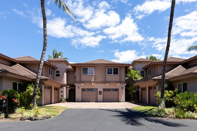 69-555 Waikoloa Beach Dr Unit 1704, Waikoloa, HI 96738 - view of front of home featuring stucco siding and a tiled roof