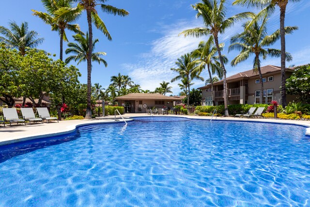 69-555 Waikoloa Beach Dr Unit 1704, Waikoloa, HI 96738 - community pool featuring a patio area