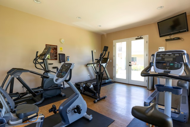 69-555 Waikoloa Beach Dr Unit 1704, Waikoloa, HI 96738 - exercise room with french doors, wood finished floors, and recessed lighting