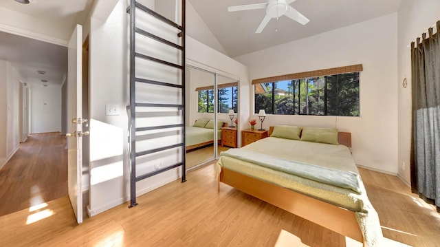 4740 Lae Rd, Kalaheo, HI 96741 - bedroom featuring lofted ceiling, light wood-style flooring, baseboards, a closet, and a ceiling fan