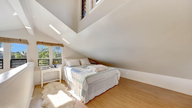 4740 Lae Rd, Kalaheo, HI 96741 - bedroom featuring light wood-style floors, baseboards, and a skylight