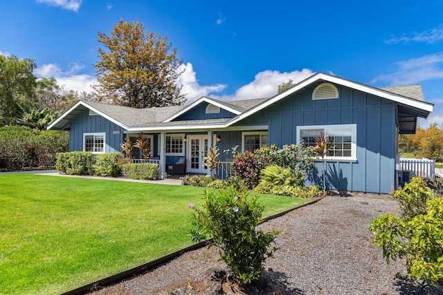 71-1876 Puu Lani Loop, Kailua-Kona, HI 96740 - ranch-style house featuring board and batten siding, a front yard, and a porch