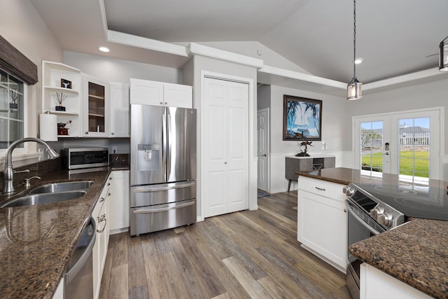71-1876 Puu Lani Loop, Kailua-Kona, HI 96740 - kitchen with appliances with stainless steel finishes, a sink, white cabinetry, french doors, and dark wood-type flooring