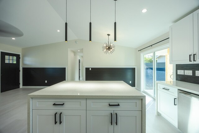 16-2100 Silveroak Dr, Pahoa, HI 96778 - kitchen with dishwasher, vaulted ceiling, plenty of natural light, white cabinets, and recessed lighting