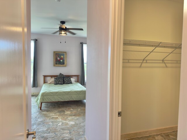 94-5763 Awa Pae Pl, Naalehu, HI 96772 - bedroom with ceiling fan and baseboards