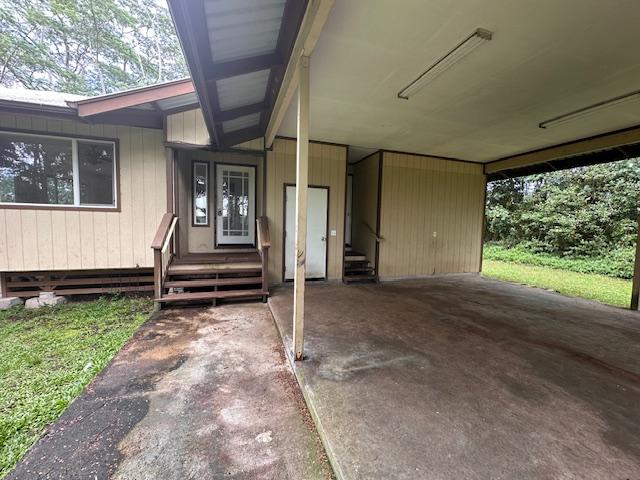 15-1415 14th Ave, Keaau, HI 96749 - property entrance with a carport