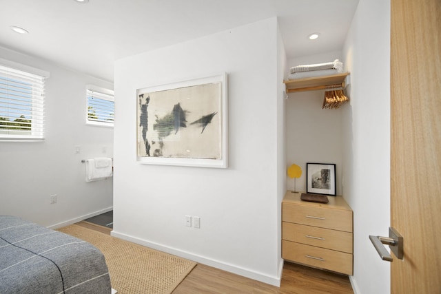 2-3161 Kaumualii Hwy Unit 2, Kalaheo, HI 96741 - bedroom with wood finished floors, baseboards, and recessed lighting