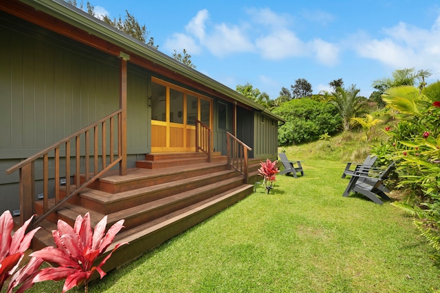 2-3161 Kaumualii Hwy Unit 2, Kalaheo, HI 96741 - view of green lawn with entry steps and a sunroom
