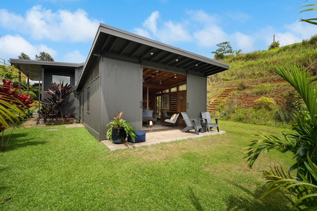2-3161 Kaumualii Hwy Unit 2, Kalaheo, HI 96741 - rear view of house with a patio area, a yard, and stairs