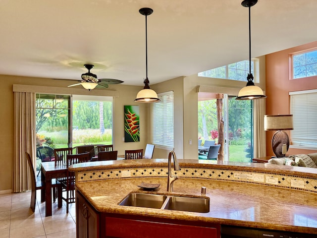 68-180 Waikoloa Beach Dr Unit P4, Waikoloa, HI 96738 - kitchen with a sink, ceiling fan, light tile patterned flooring, light stone counters, and pendant lighting